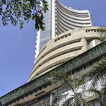 Markets settle on flat note; Sensex declines 34 points