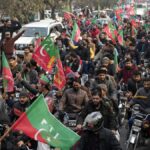 Pakistani police use tear gas to disperse pre-election rally by supporters of former leader Khan