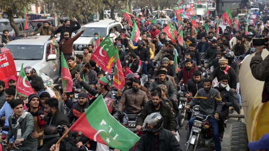 Pakistani police use tear gas to disperse pre-election rally by supporters of former leader Khan